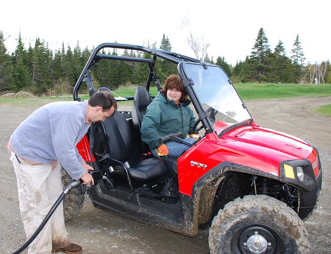 ATV filling up gas tank at Kokadjo